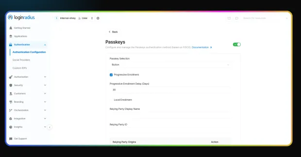 LoginRadius admin dashboard showing Passkeys configuration under Authentication settings. Options include Progressive Enrollment, Delay in days, Local Enrollment, and Relying Party details.