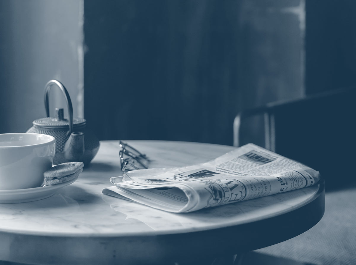 Newspaper on table